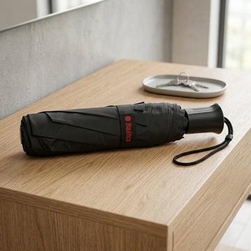 Easy-carry triple-fold rain umbrella