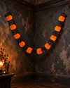 Halloween orange and black pumpkin honeycomb accordion paper garland banner