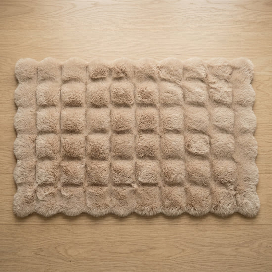 Soft rectangular floor mat in brown for home interiors