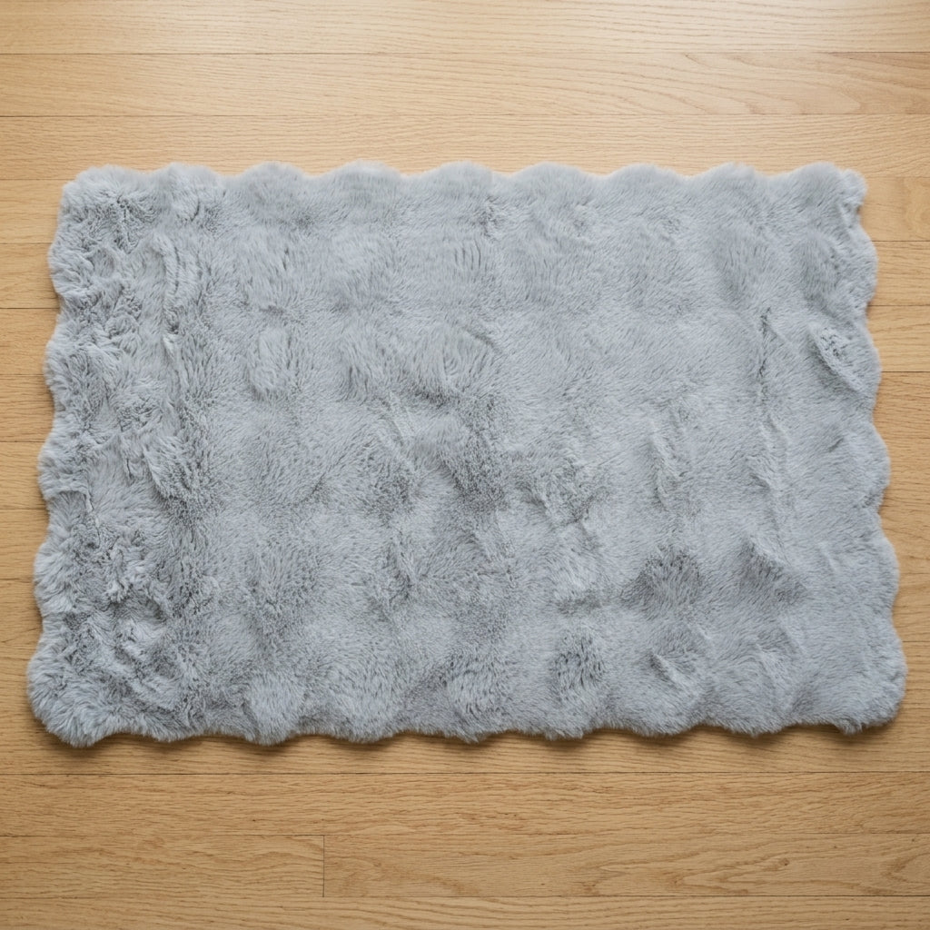 Soft rectangular floor mat in gray for home interiors