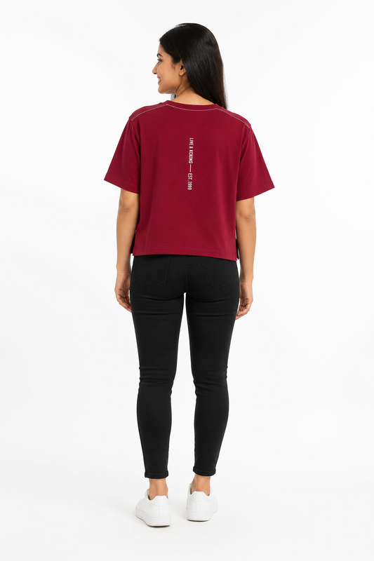 Back view of women's maroon graphic T-shirt