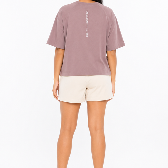 Back view of women's lilac graphic T-shirt