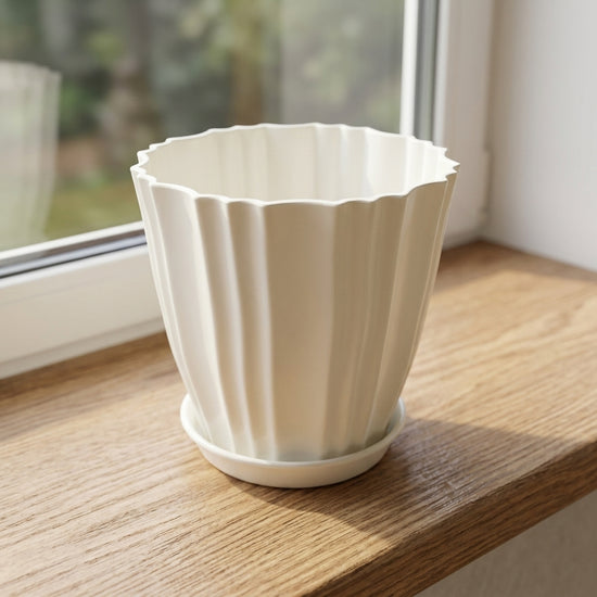 White ridged flower pot with matching tray