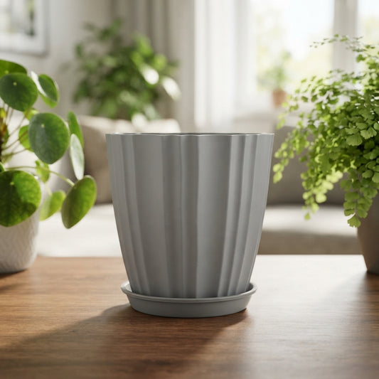 Gray ridged plastic flower pot with tray
