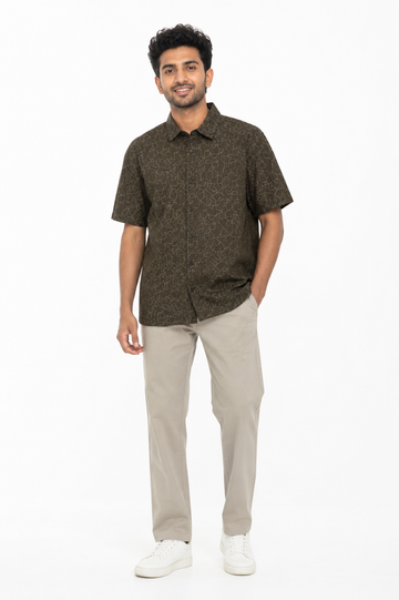 Men's dark green short sleeve shirt with abstract line print