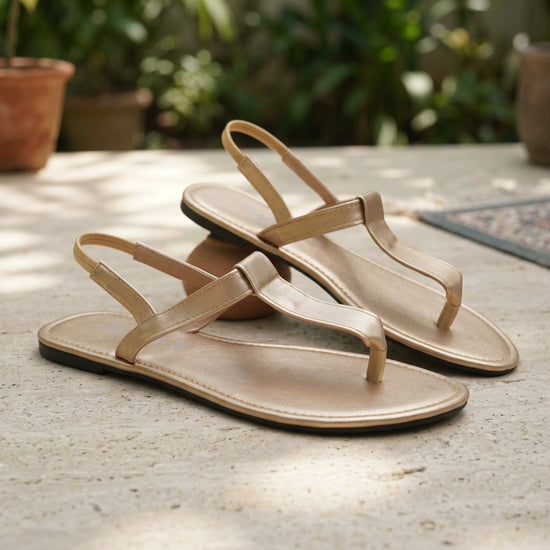 Women's Metallic Champagne Gold T-Strap Slingback Flat Sandals - Perspective Pair View (Photo 1)