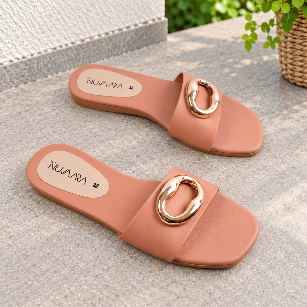Nuvaara women's black flat slide sandals with glossy oval buckle accent and square toe