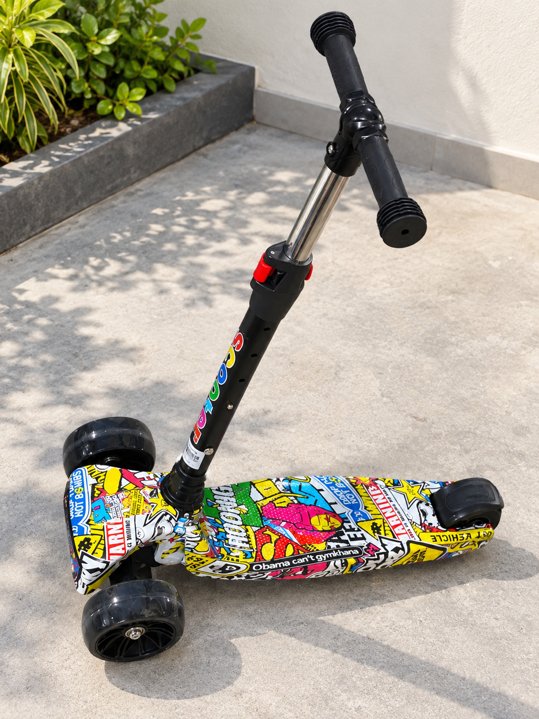 Kids 3-wheel adjustable kick scooter with printed deck front view