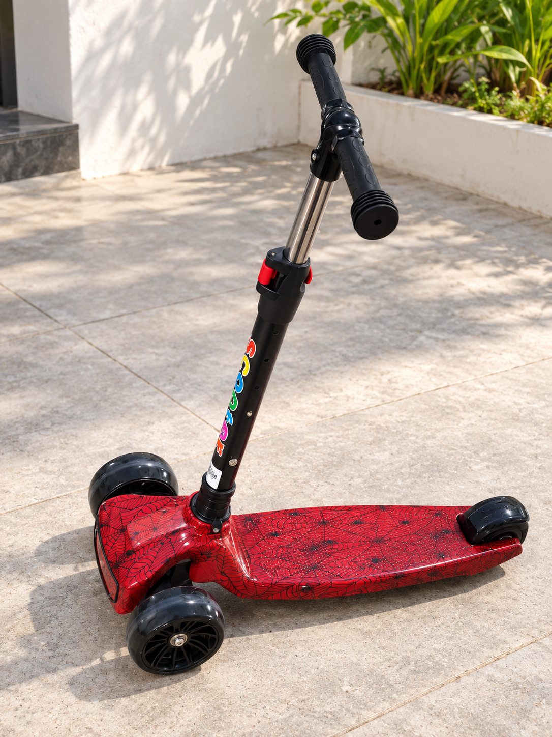 Kids 3-wheel adjustable kick scooter handle and wheels detail