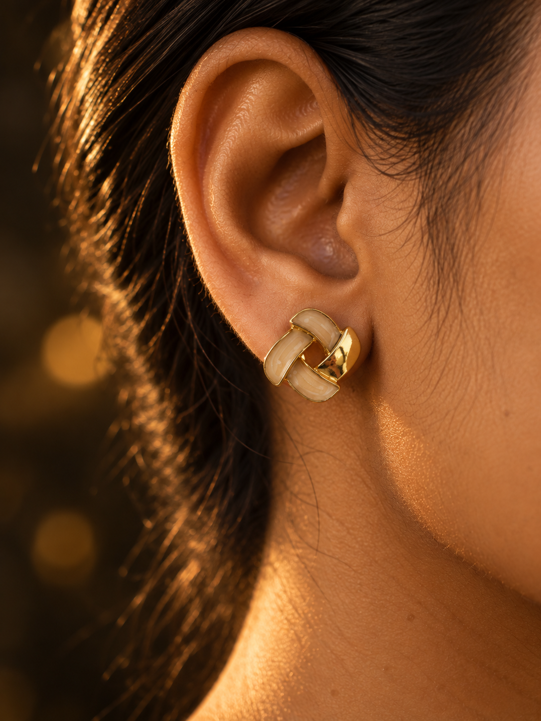 NUVAARA vintage style cream enamel and gold interwoven geometric knot stud earrings