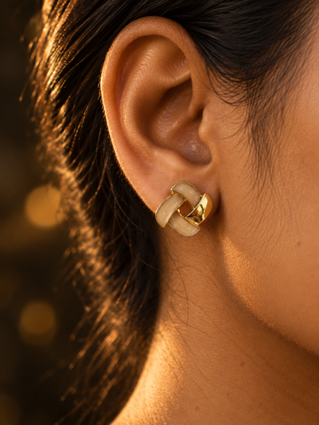 NUVAARA vintage style cream enamel and gold interwoven geometric knot stud earrings