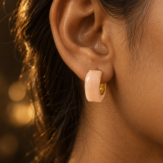 NUVAARA pink marbled resin curved huggie hoop earrings with gold-tone rim