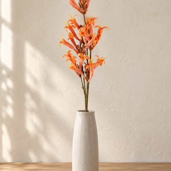 T & Co. 68cm artificial orange trumpet flower stem spray arranged in ceramic vase