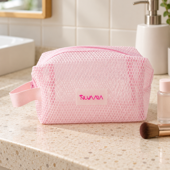 Pastel pink breathable mesh cosmetic pouch with side handle and zipper closure