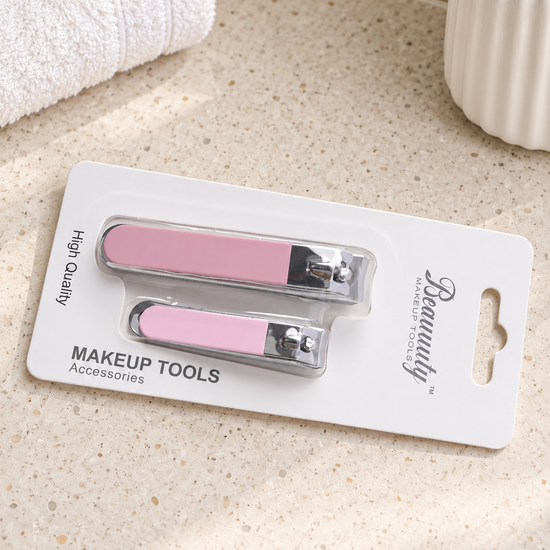 Beauuuty 2-piece stainless steel nail clipper set with pastel pink handles blister pack