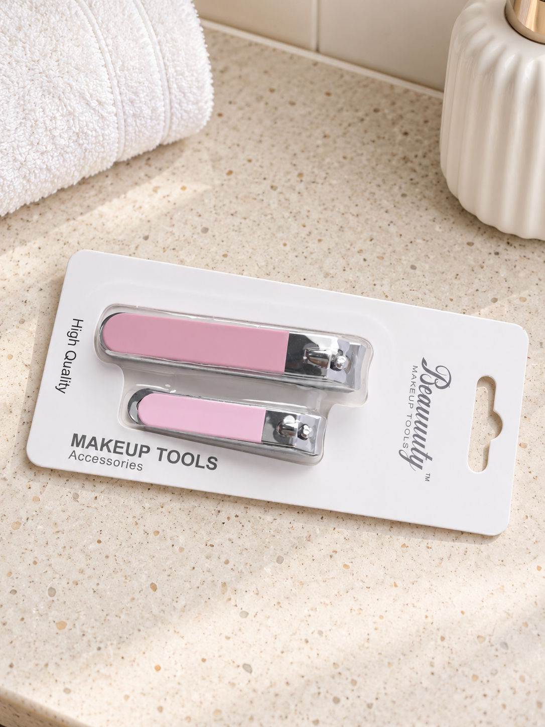 Beauuuty 2-piece stainless steel nail clipper set with pastel pink handles blister pack