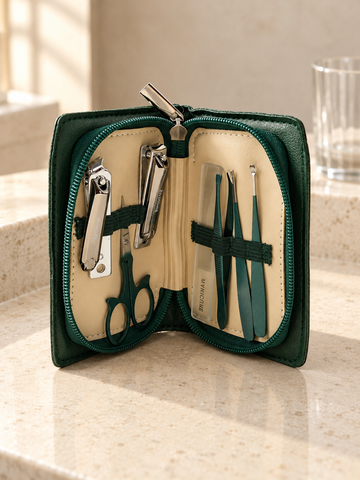 6-piece travel manicure and grooming kit in deep green faux-leather zippered case
