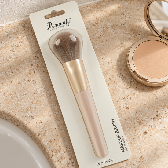 Beauuuty fluffy dome powder and blush makeup brush with matte champagne gold ferrule and nude blush handle in retail blister packaging