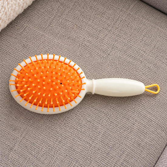 Beauuuty White and Orange Mini Paddle Hair Brush with Ball-Tipped Bristles available at Thilakma Sri Lanka
