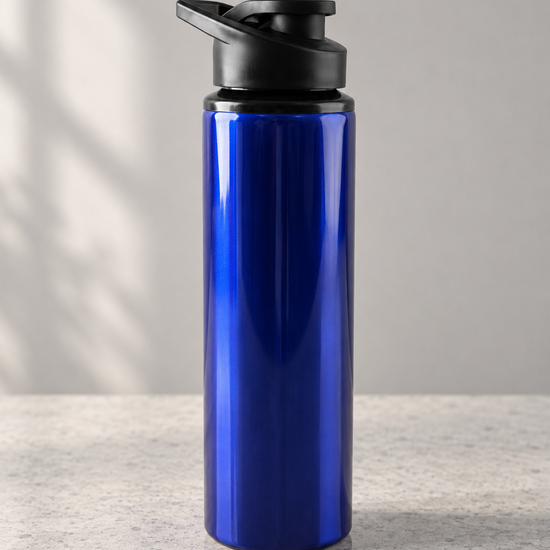 T&CO vibrant royal blue ergonomic sports water bottle with flip-up spout and integrated carry handle