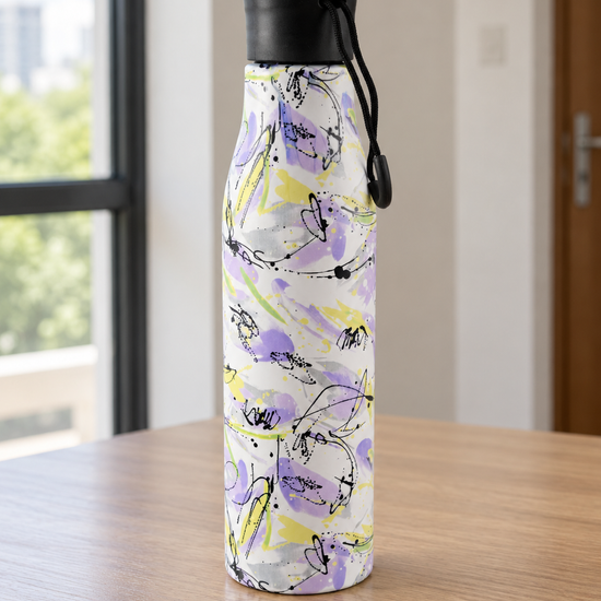 T&CO insulated stainless steel water bottle featuring an artistic lavender and yellow watercolor floral motif with black carry cord loop