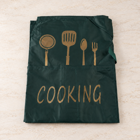 Fresh waterproof dark forest green kitchen apron with front pocket, golden utensil print, and COOKING script