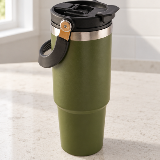 T&CO rugged olive green vacuum insulated travel tumbler with top swing carry handle, stainless steel rim, and flip spout lid