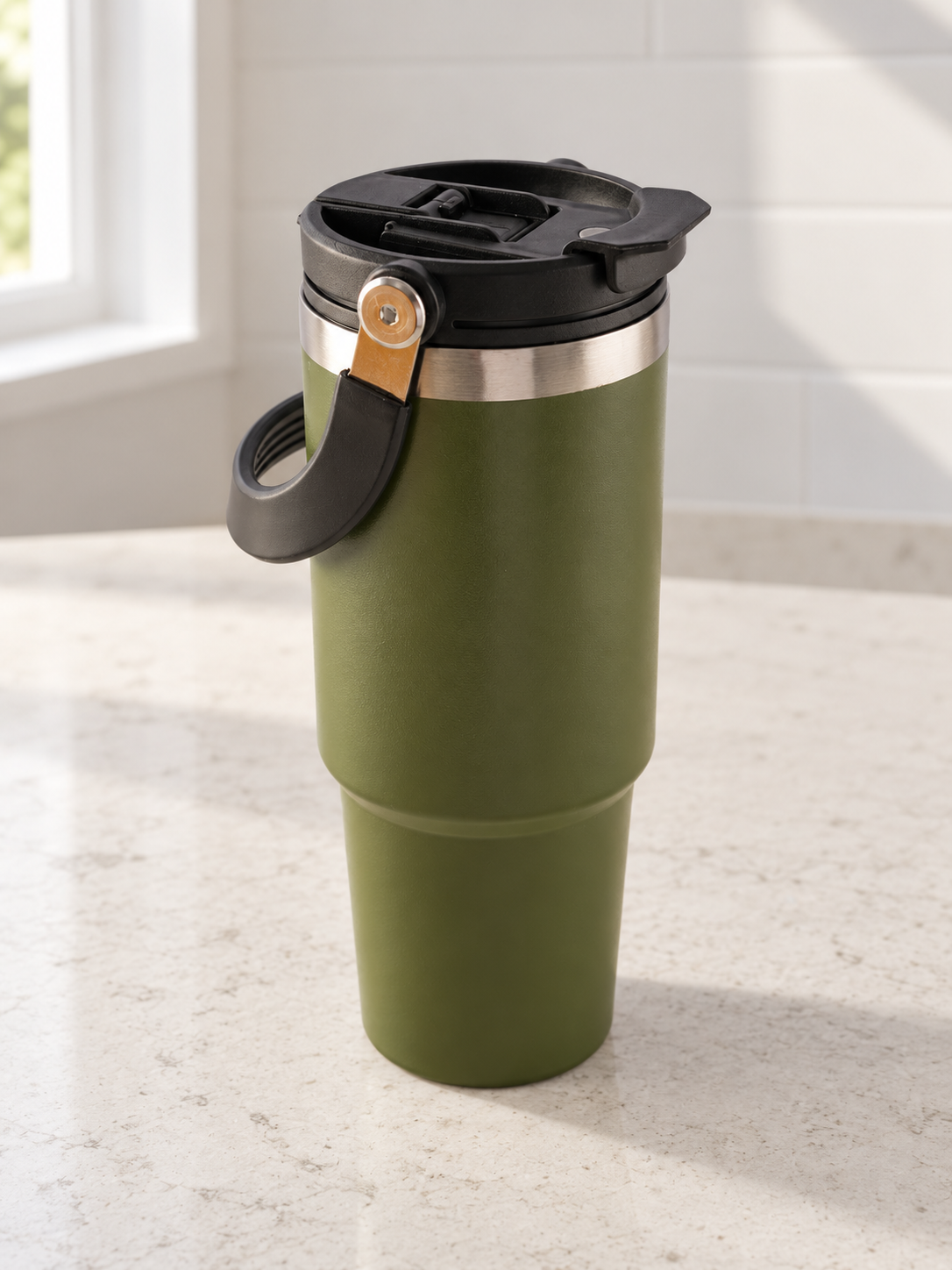 T&CO rugged olive green vacuum insulated travel tumbler with top swing carry handle, stainless steel rim, and flip spout lid