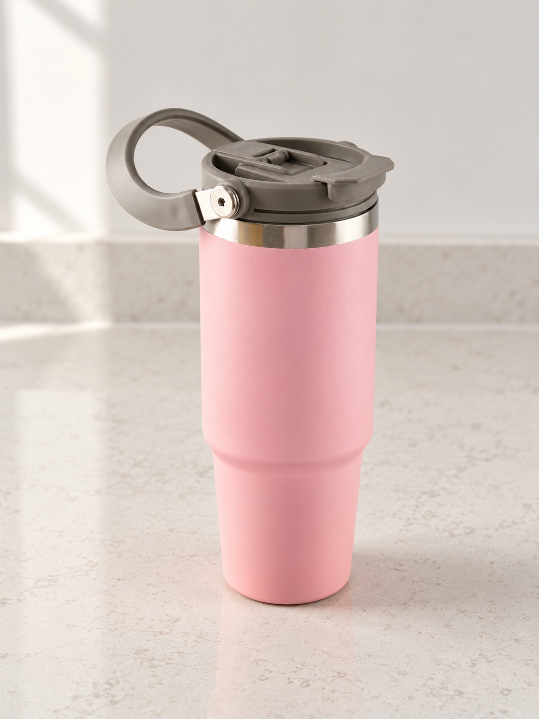 T&CO blush pink vacuum insulated travel tumbler with top folding swing carry handle and leak-resistant flip lid
