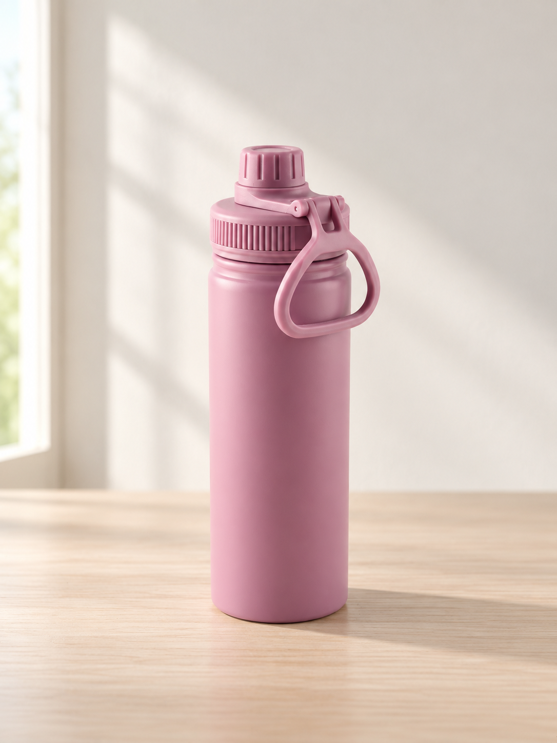 T&CO sports water bottle in elegant matte dusty rose mauve with ribbed leak-proof screw cap and carry loop