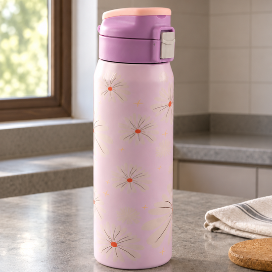T&CO pastel lilac vacuum insulated flask featuring white daisy floral pattern and push-button flip lid with safety latch