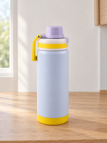 T&CO colorblock insulated sports bottle in pastel baby blue with vibrant yellow protective base and folding carry handle