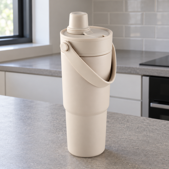 T&CO warm oatmeal beige insulated travel tumbler with folding swing carry handle and dual-action sipping spout lid