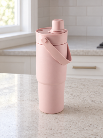T&CO blush pink insulated travel tumbler with folding swing carry handle and dual-action sipping spout lid