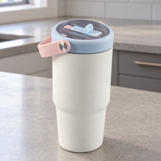 T&CO cream off-white vacuum insulated travel tumbler with pastel pink swing carry handle and pastel blue sip flap