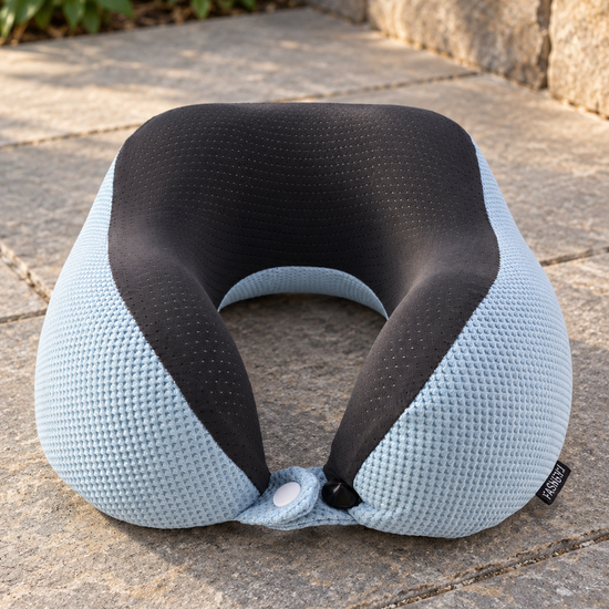 T&CO sky blue breathable waffle knit memory foam travel neck pillow with black mesh inner lining and snap button closure