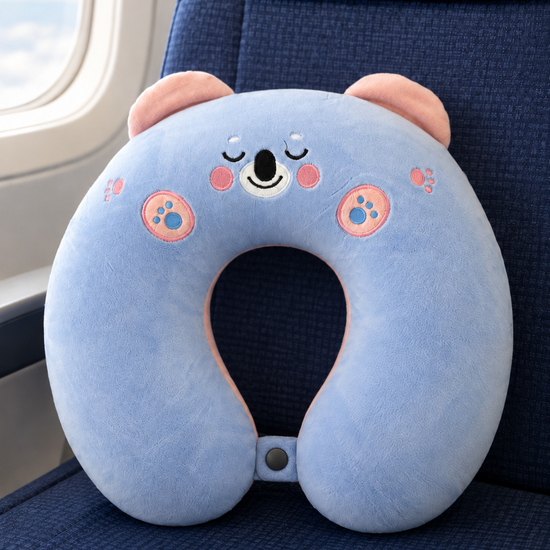 T&CO cute plush animal travel neck pillow in pastel baby blue koala bear design with pink inner ears and snap closure