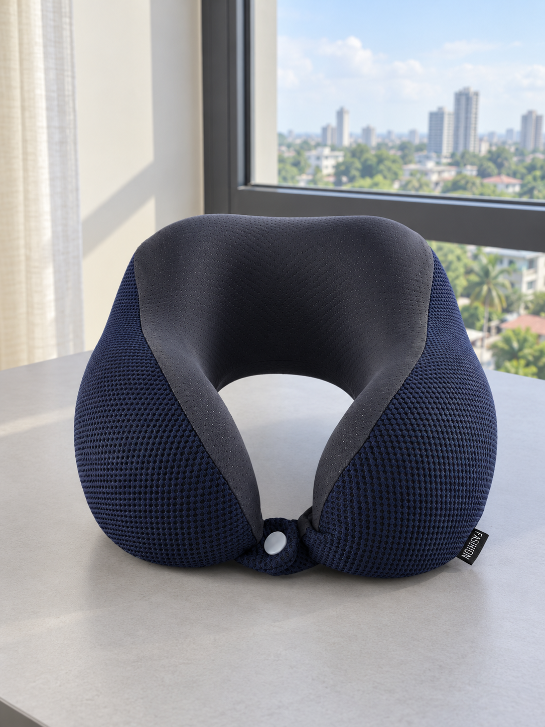 T&CO navy blue breathable waffle knit memory foam travel neck pillow with dark mesh inner lining and snap button closure