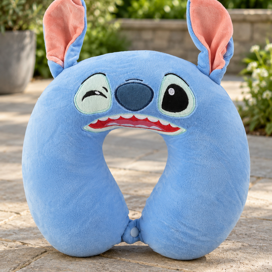 T&CO cute cartoon blue alien character plush travel neck pillow with large ears, embroidered winking face, and snap closure