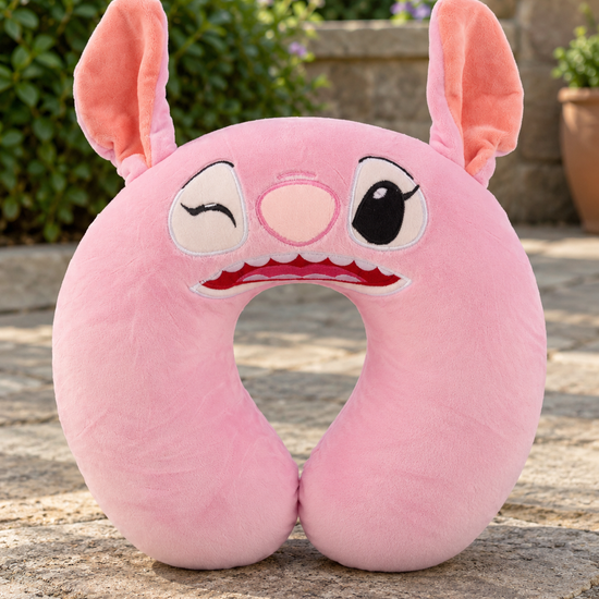 T&CO cute pink cartoon character plush travel neck pillow with 3D antenna ears, embroidered winking face, and front snap button