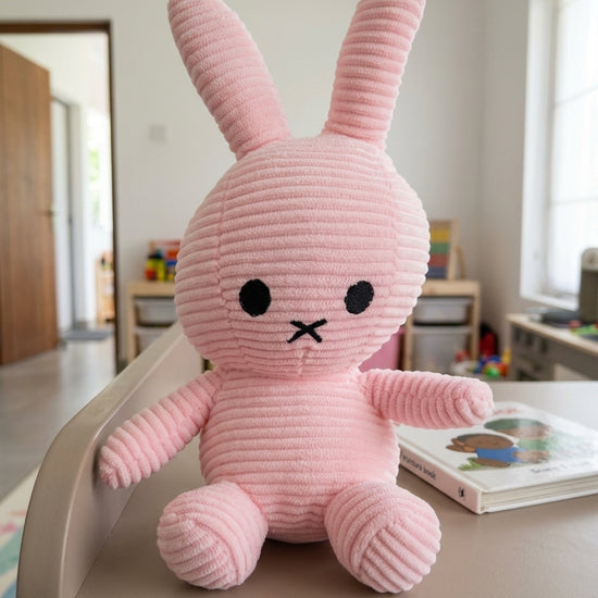 T&CO cute 23cm pastel pink ribbed corduroy bunny plush toy with upright ears and embroidered cross mouth in Miffy style