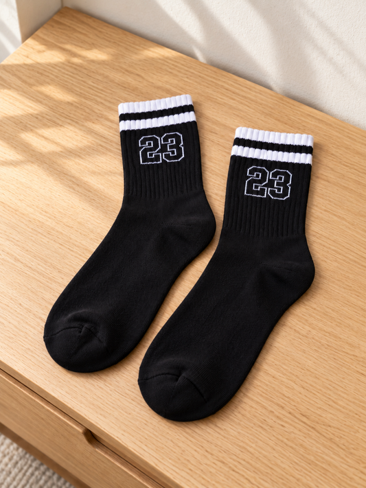 Notch men's athletic black crew socks with white double varsity stripes and white outline '23' jersey number embroidery