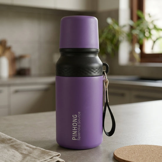 Double-wall stainless steel insulated vacuum flask water bottle in metallic pastel purple with detachable drinking cup lid