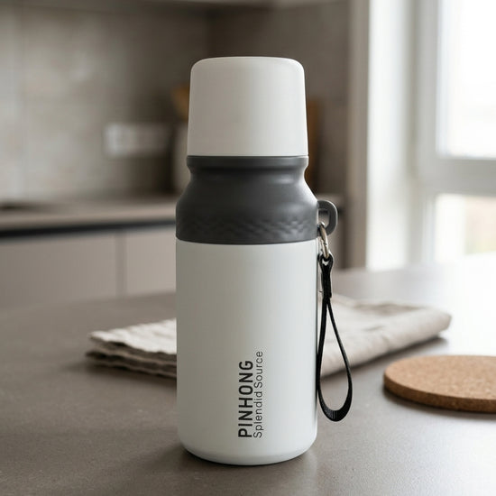 Double-wall stainless steel insulated vacuum flask water bottle in crisp pearl white with detachable drinking cup lid