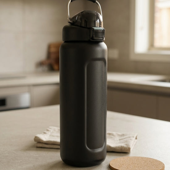 Safety flip-lock insulated stainless steel water bottle in matte black with one-touch push-button flip lid