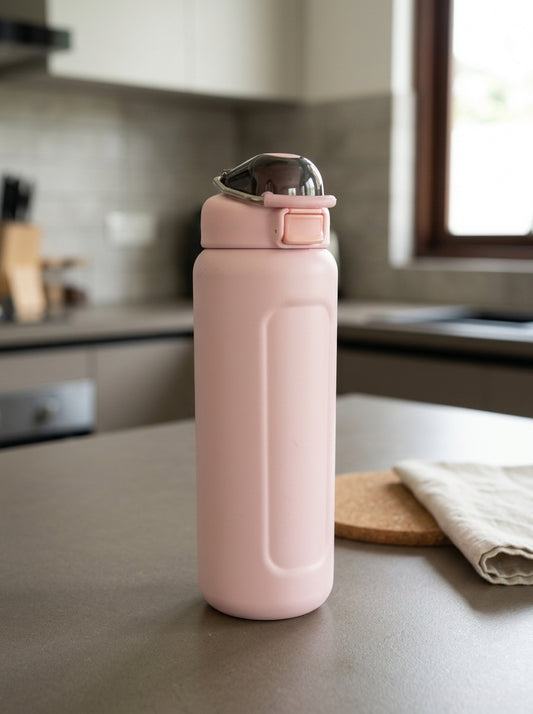 Safety flip-lock insulated stainless steel water bottle in pastel blush pink with one-touch push-button flip lid
