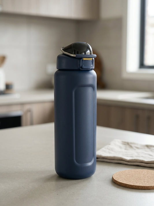 Safety flip-lock insulated stainless steel water bottle in deep navy blue with one-touch push-button flip lid