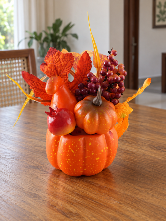 T&CO decorative autumn harvest pumpkin tabletop floral accent featuring rustic orange pumpkin, realistic foliage, and pinecone elements, 18cm height