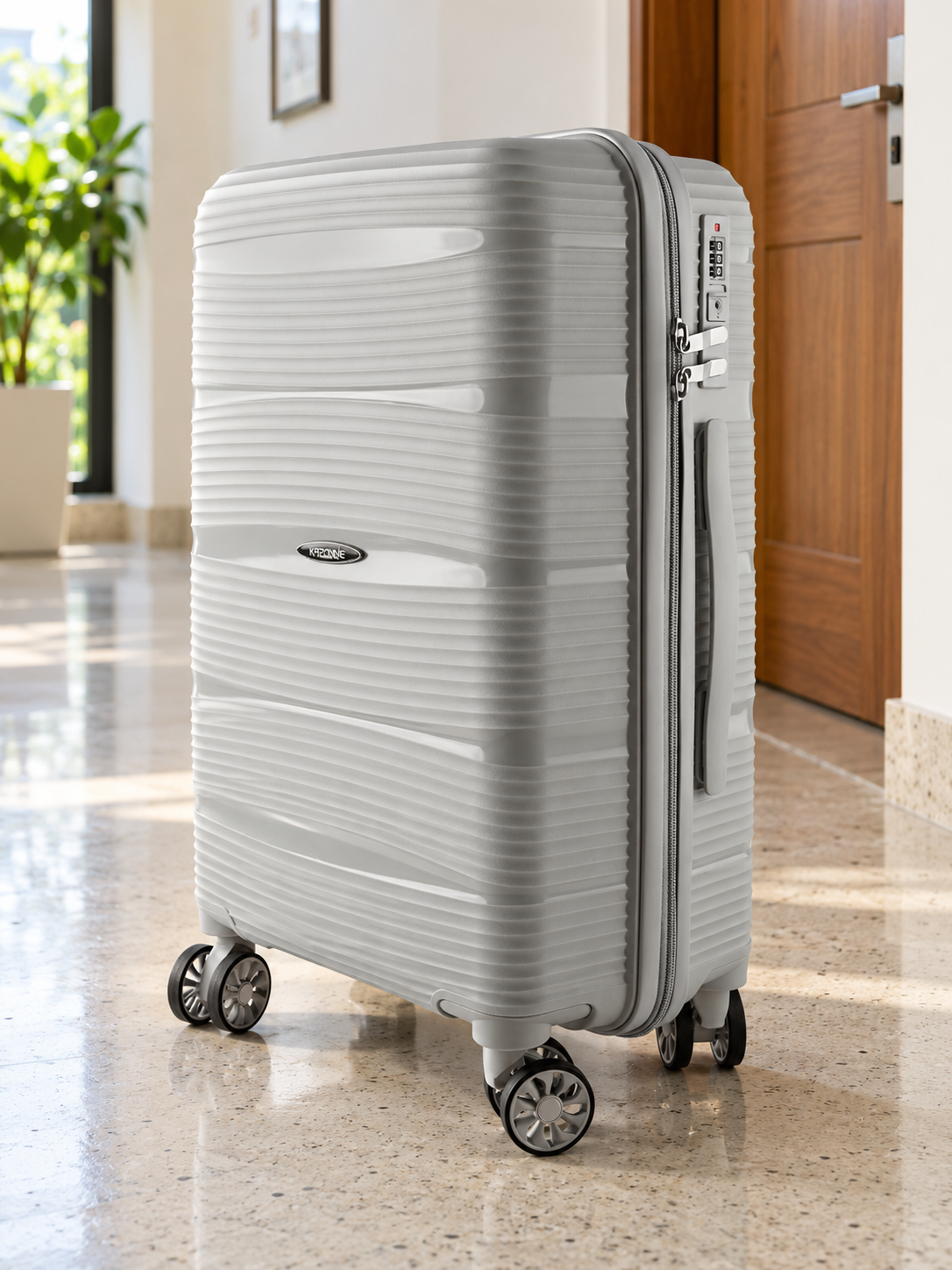 T&CO 801 hardshell 360-degree spinner cabin luggage suitcase in metallic silver grey, 20 inch cabin size with telescoping handle
