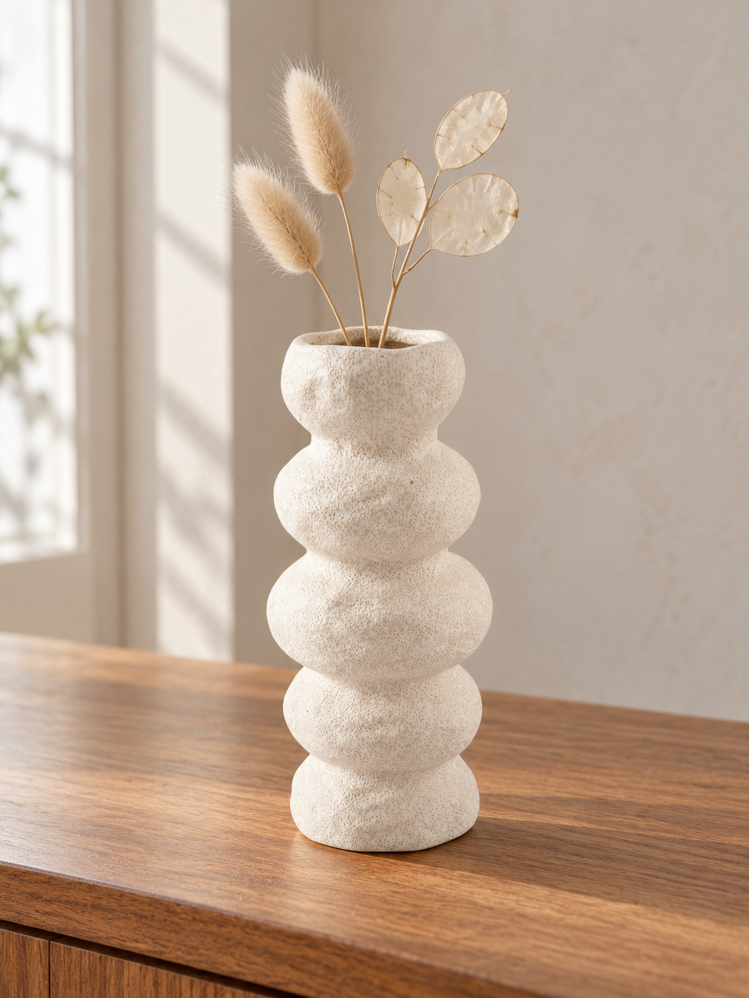 T&CO modern ceramic stacked ring bubble flower vase in textured cream stone finish 23cm styled with dried bunny tail grasses